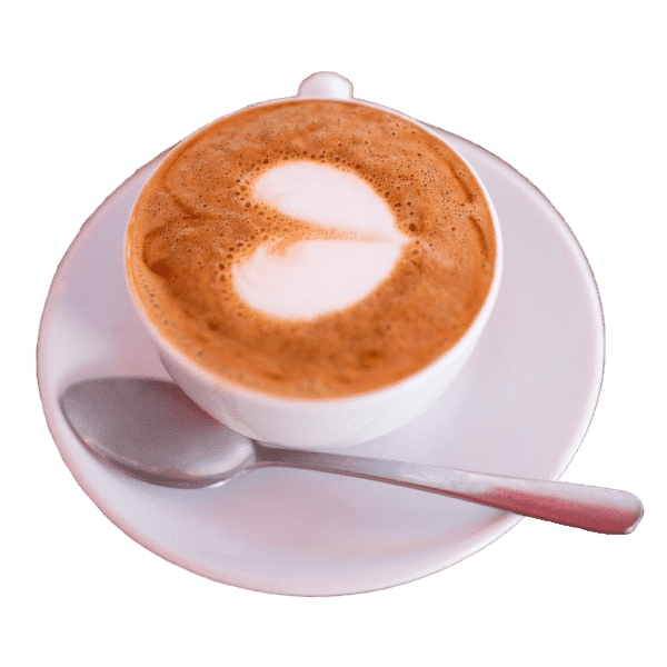 Cappuccino on a plate along side a spoon