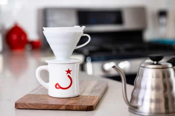 Hario Ceramic V60 dripper on top of RItual mug