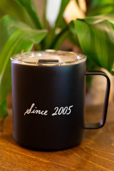 A black mug that says "Since 2005."